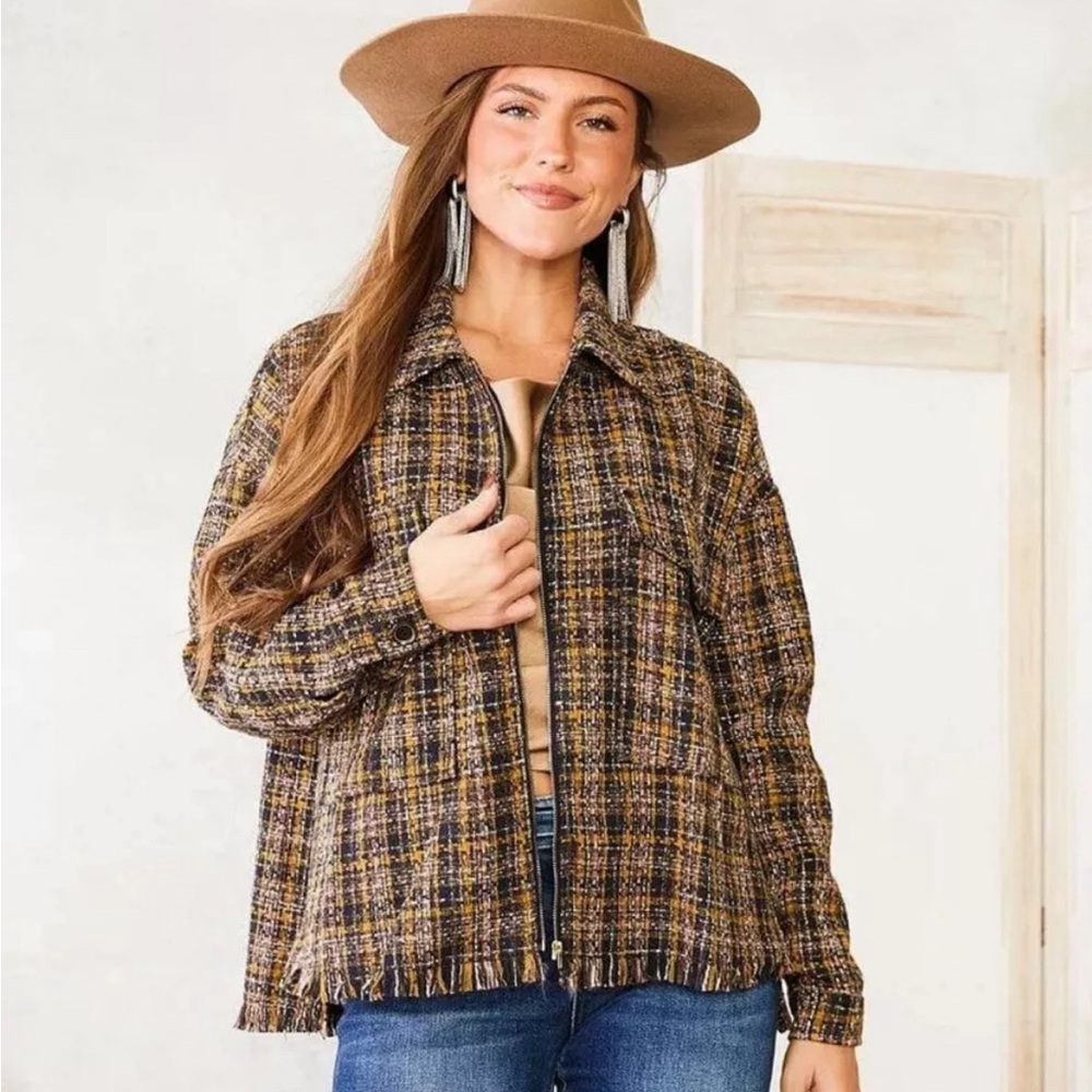 A.Peach plaid shirt, jacket with frayed edges size large